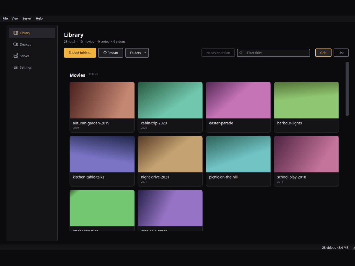 The lantv window on a desktop, its Library page showing a grid of home videos, each with a thumbnail taken from the file itself.